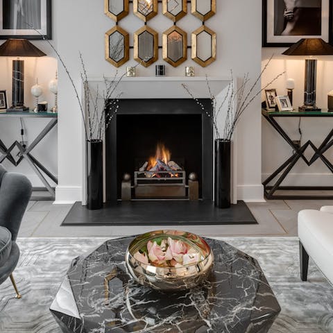 nestle in front of the fireplace