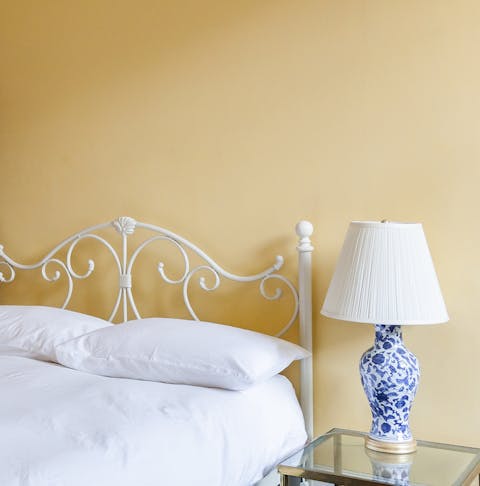 This sunny yellow bedroom
