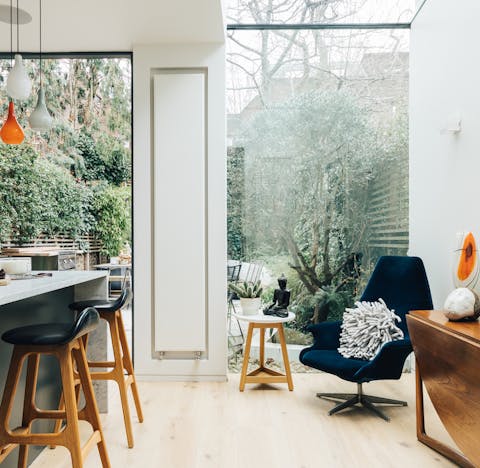 Floor-to-ceiling windows with garden views