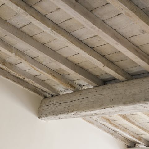The sloped wooden ceiling